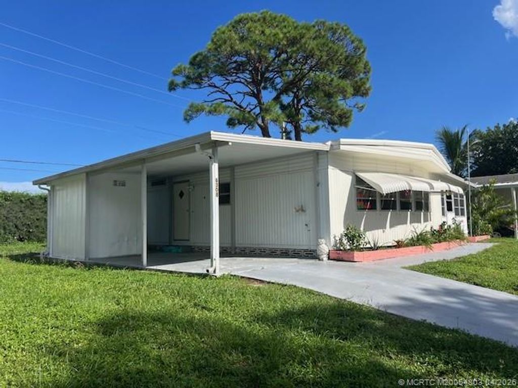 Photo of 6308 S Ash Lane, Lantana, FL 33467 (MLS # M20054803)