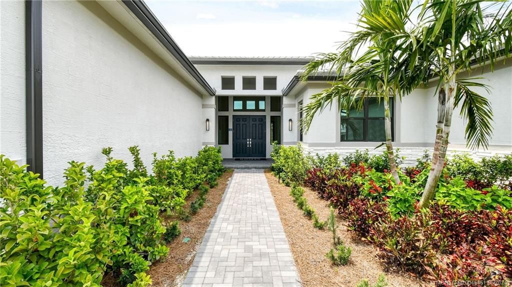 Photo of 5383 SW Pomegranate Way, Palm City, FL 34990 (MLS # M20045451)