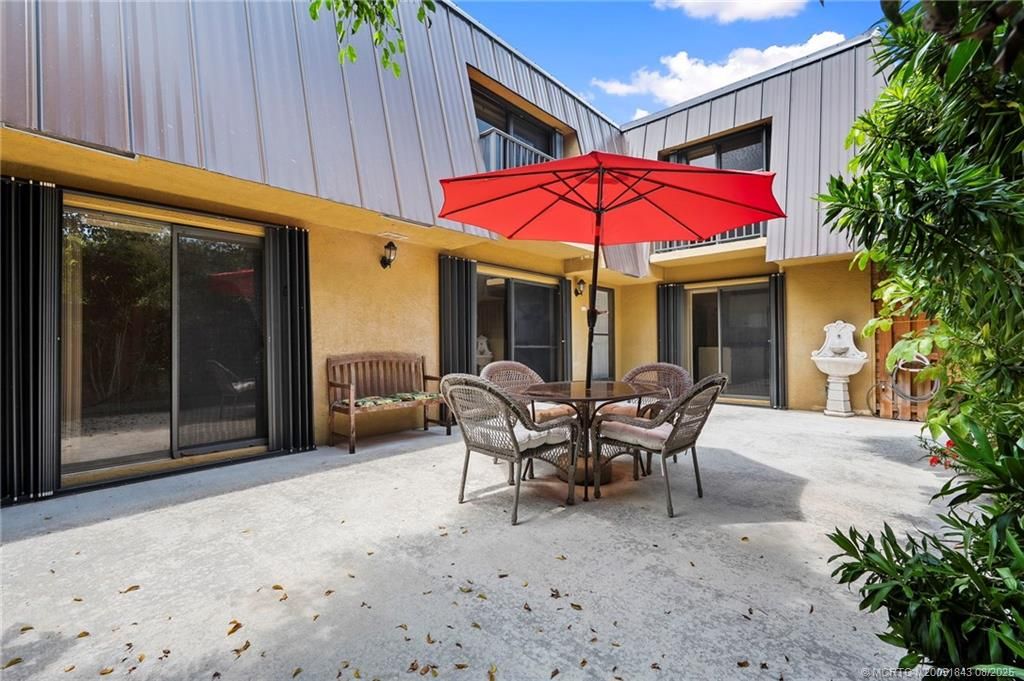 Photo of 6143 SE Windsong Lane #1025, Stuart, FL 34997 (MLS # M20051843)