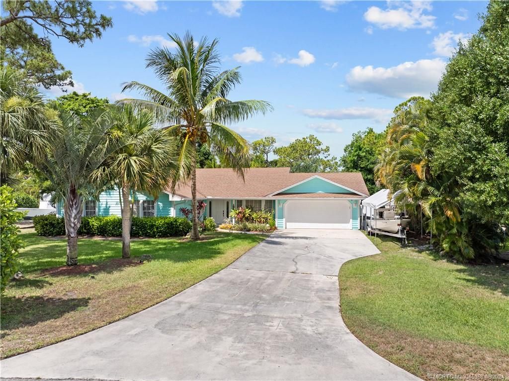 Photo of 1162 SW Pine Tree Lane, Palm City, FL 34990 (MLS # M20045358)