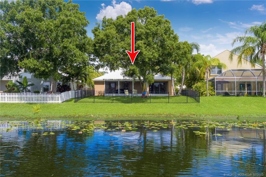 Photo of 889 NW Waterlily Place, Jensen Beach, FL 34957 (MLS # M20040341)