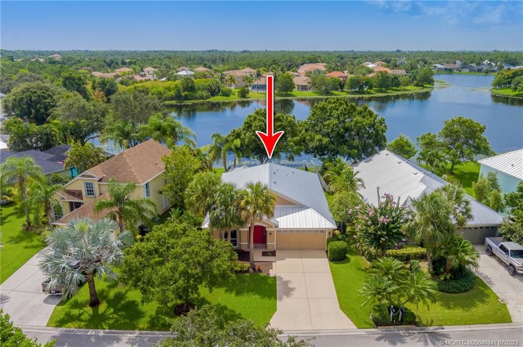 Photo of 889 NW Waterlily Place, Jensen Beach, FL 34957 (MLS # M20040341)