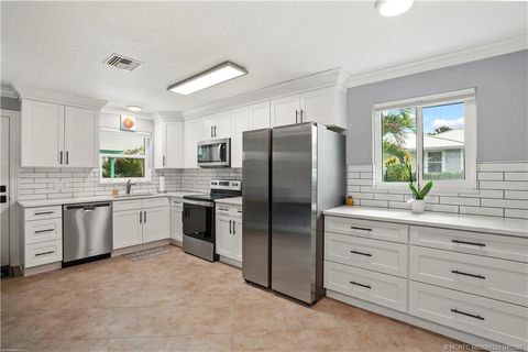 Photo of 1114 NE Orange Avenue, Jensen Beach, FL 34957 (MLS # M20055228)