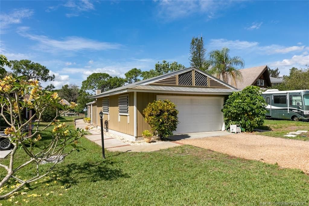 Photo of 1328 SW Evergreen Lane, Palm City, FL 34990 (MLS # M20039072)