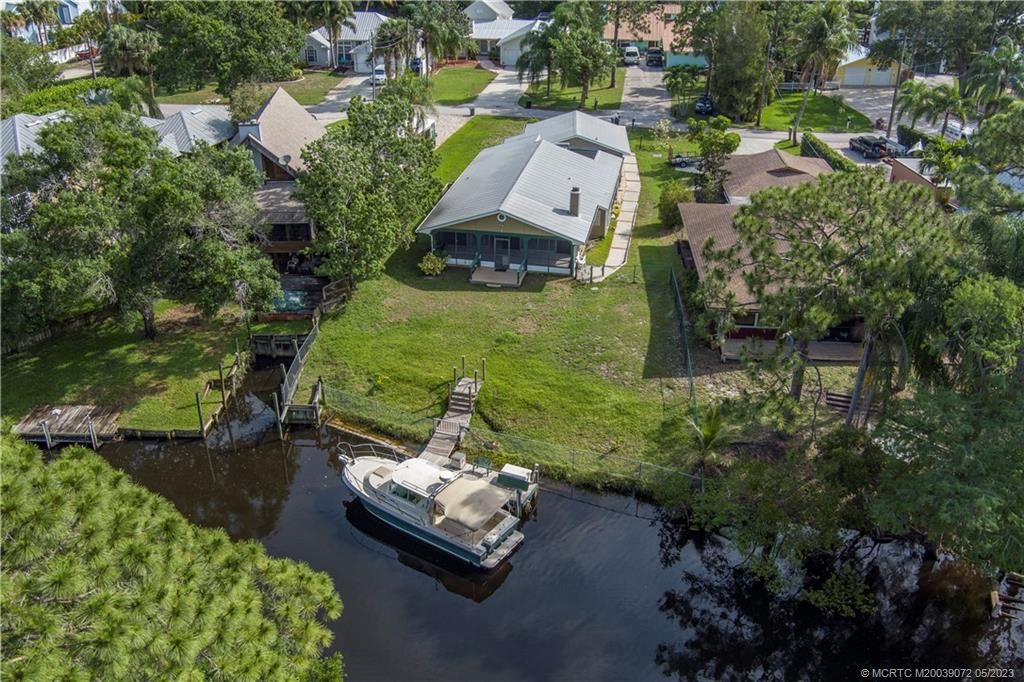 Photo of 1328 SW Evergreen Lane, Palm City, FL 34990 (MLS # M20039072)