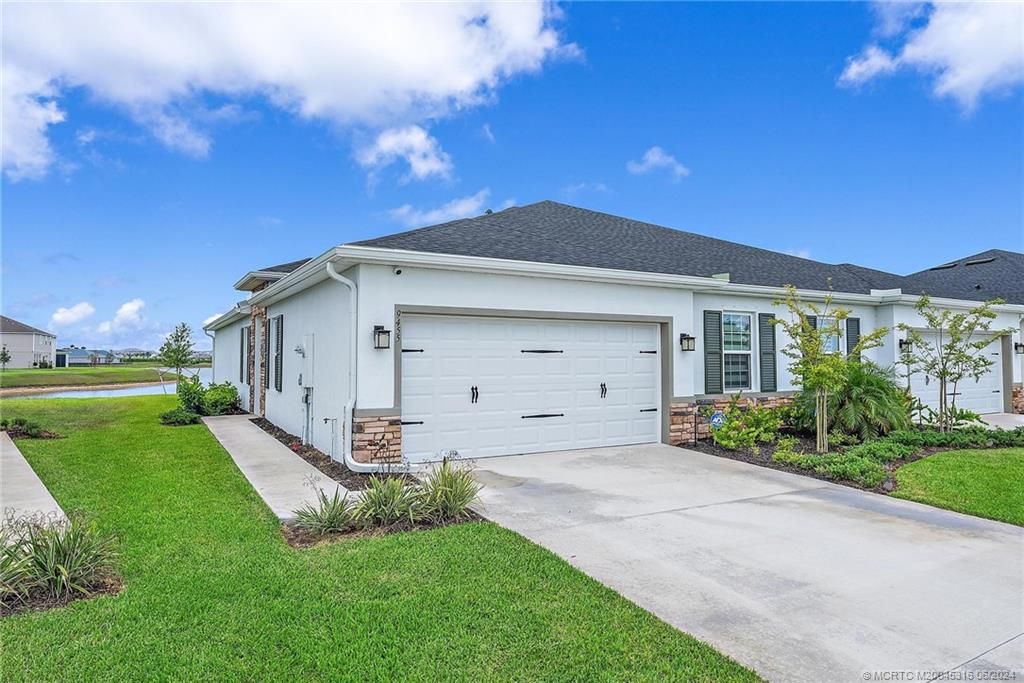 Photo of 9455 SW Libertas Way, Port Saint Lucie, FL 34987 (MLS # M20045316)