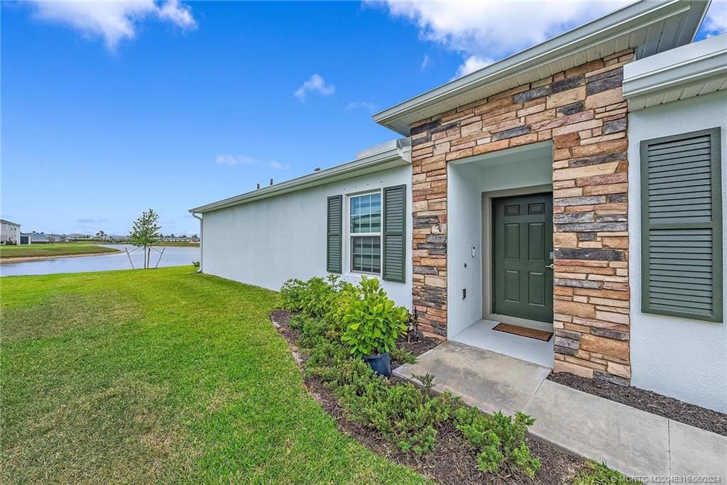 Photo of 9455 SW Libertas Way, Port Saint Lucie, FL 34987 (MLS # M20045316)