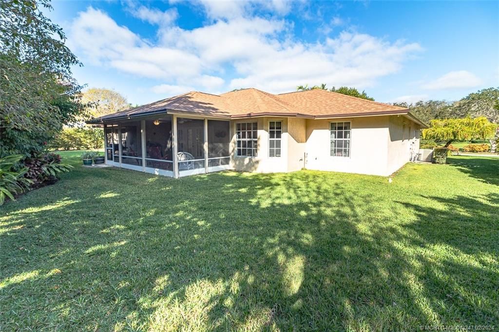 Photo of 2440 NE Pinecrest Lakes Boulevard, Jensen Beach, FL 34957 (MLS # M20043247)