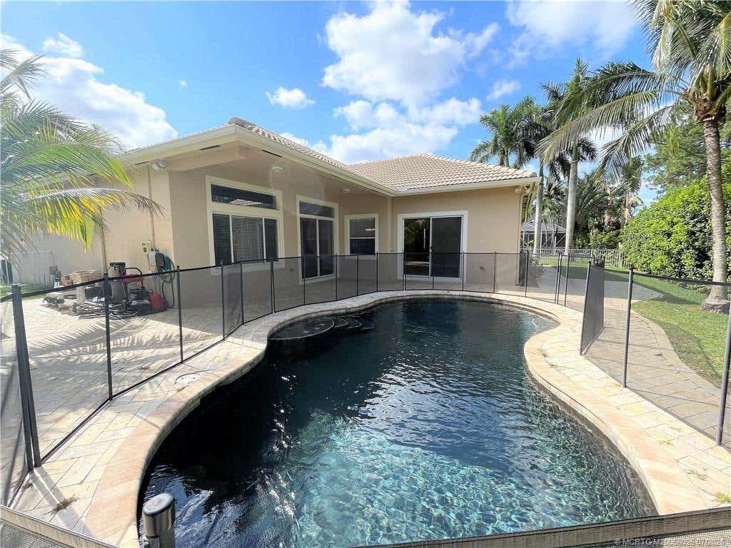 Photo of 2662 SW Newberry Court, Palm City, FL 34990 (MLS # M20056095)