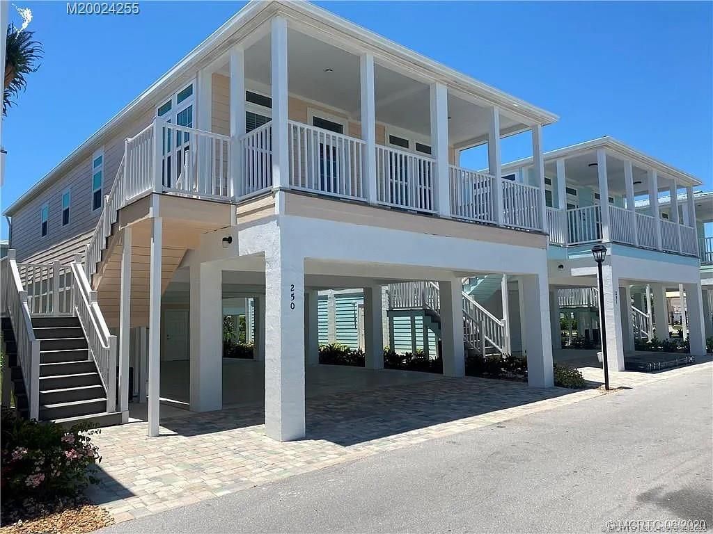 Photo of 250 NE Ebbtide Way, Jensen Beach, FL 34957 (MLS # M20040975)