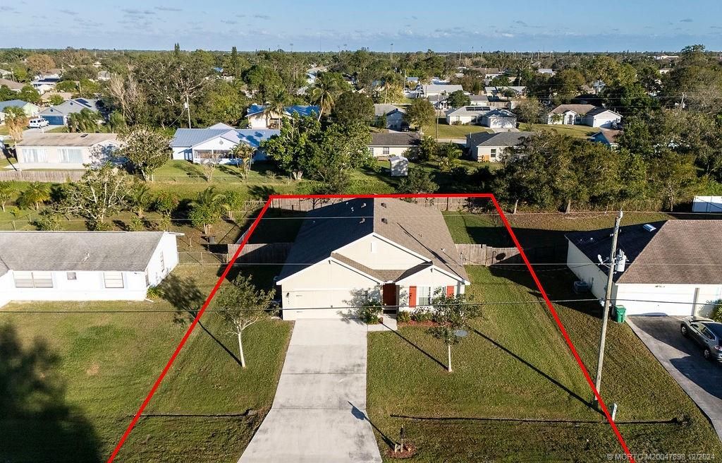 Photo of 145 NW Hibiscus Street, Port Saint Lucie, FL 34983 (MLS # M20047898)