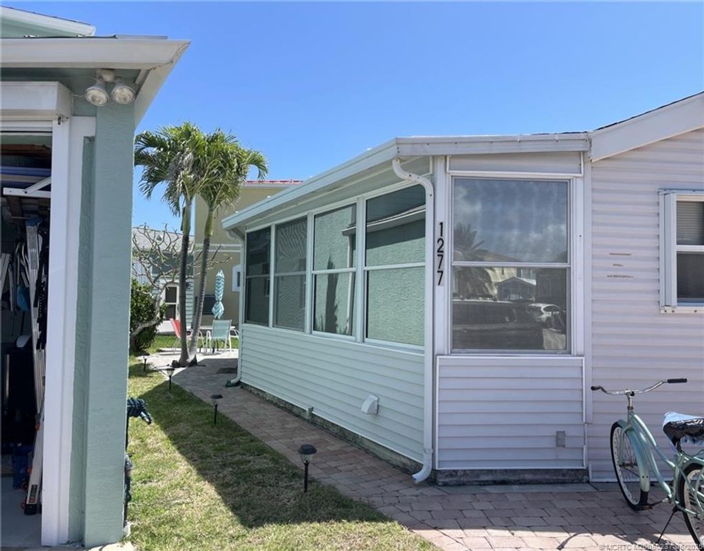 Photo of 1277 Nettles Boulevard, Jensen Beach, FL 34957 (MLS # M20050237)