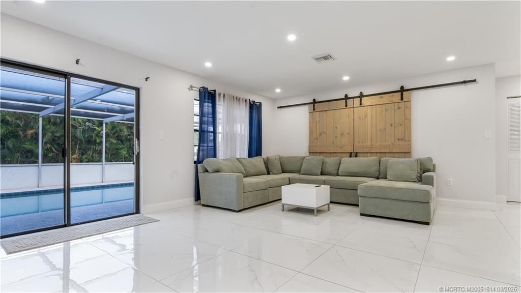 Photo of 2599 SE Westmoreland Boulevard, Port Saint Lucie, FL 34952 (MLS # M20051614)