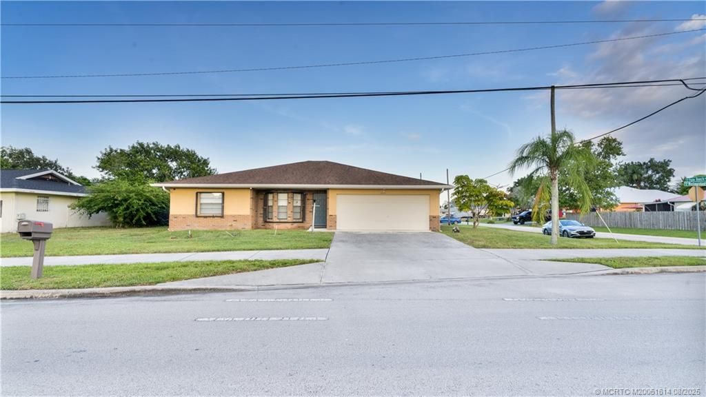 Photo of 2599 SE Westmoreland Boulevard, Port Saint Lucie, FL 34952 (MLS # M20051614)