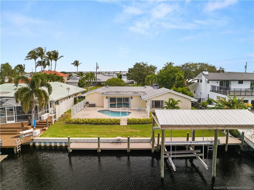 Photo of 1229 SW Dyer point Road, Palm City, FL 34990 (MLS # M20045169)