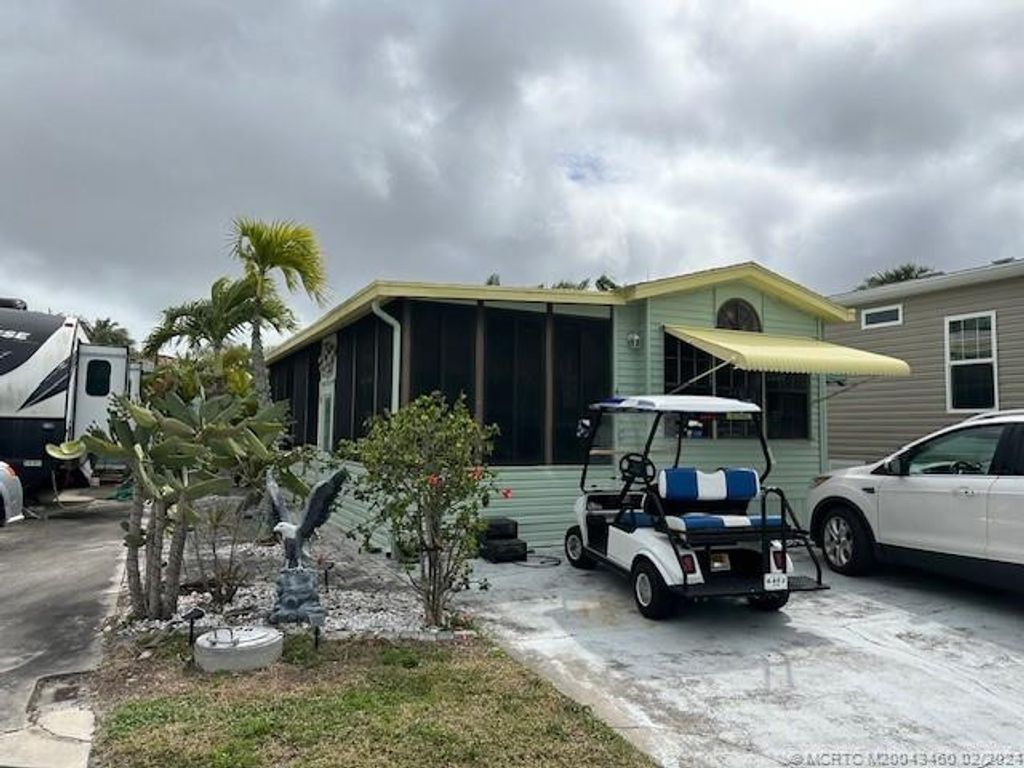 Photo of 468 Nettles Boulevard, Jensen Beach, FL 34957 (MLS # M20043460)