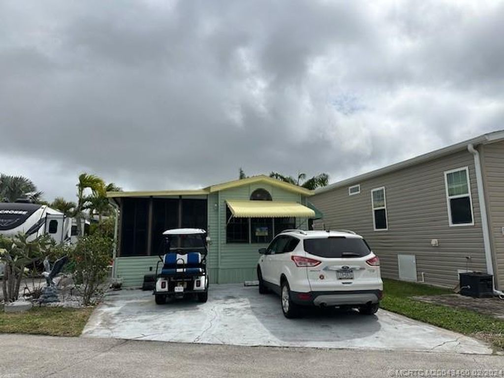 Photo of 468 Nettles Boulevard, Jensen Beach, FL 34957 (MLS # M20043460)