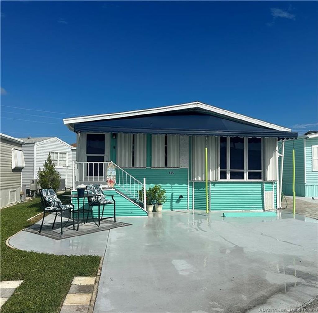 Photo of 855 Nettles Boulevard, Jensen Beach, FL 34957 (MLS # M20041696)