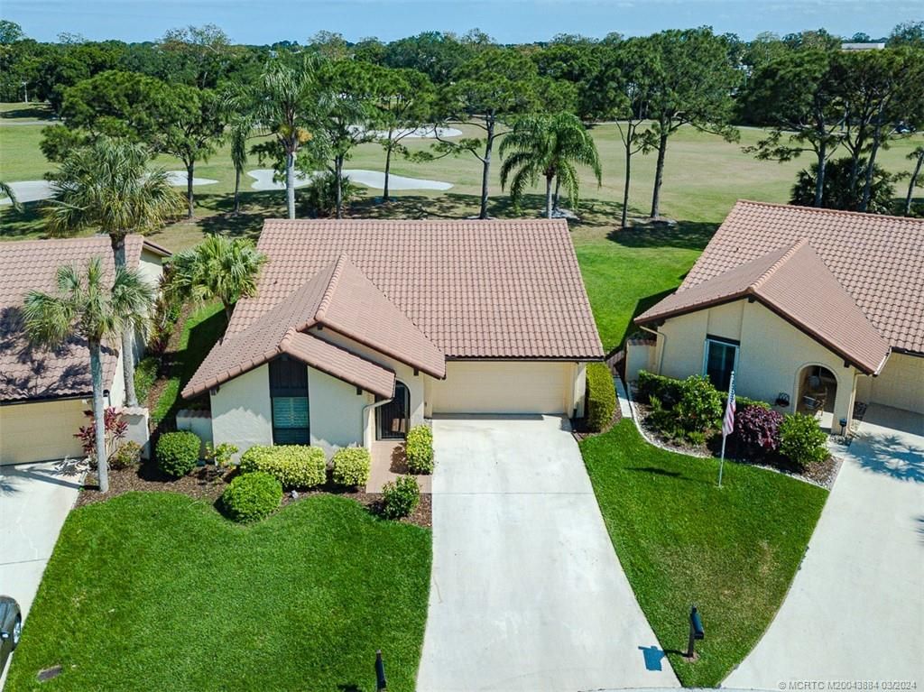 Photo of 2564 SW Bobalink Circle, Palm City, FL 34990 (MLS # M20043884)