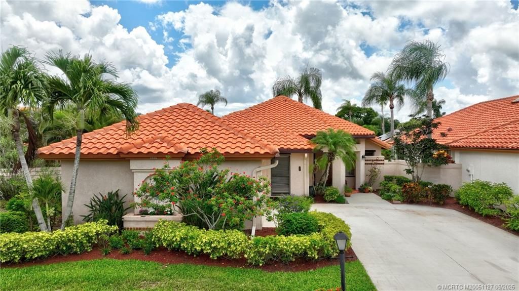 Photo of 2885 SW Mariposa Circle, Palm City, FL 34990 (MLS # M20051127)