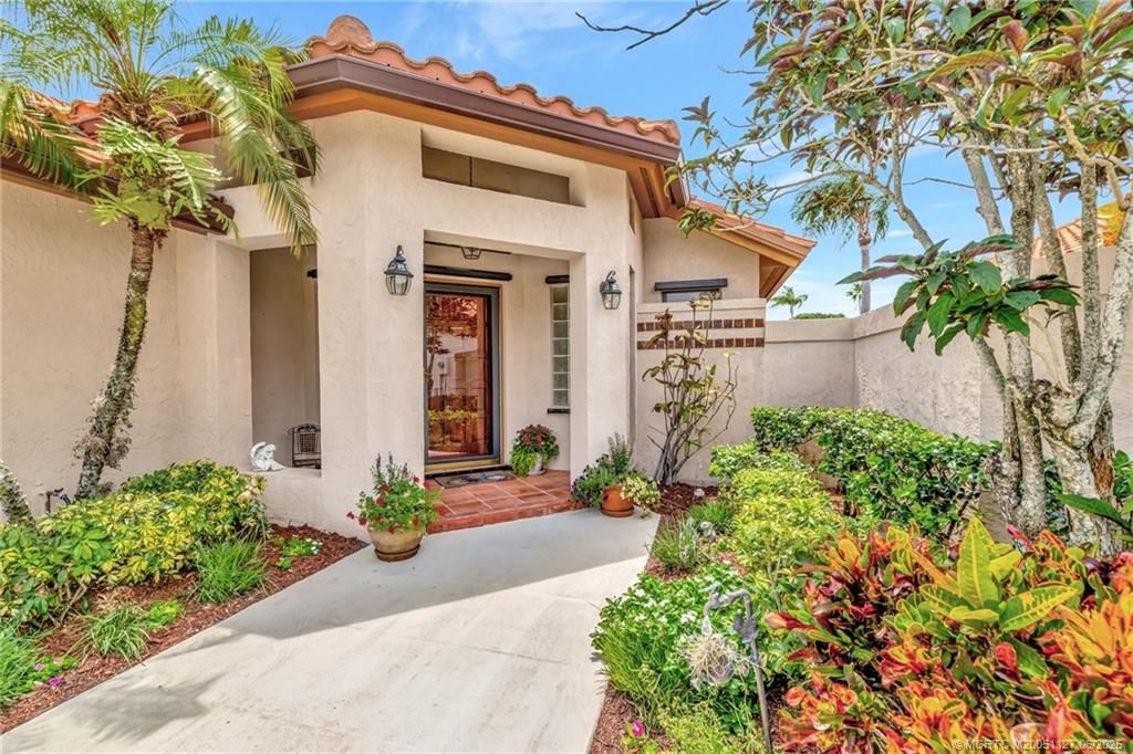 Photo of 2885 SW Mariposa Circle, Palm City, FL 34990 (MLS # M20051127)