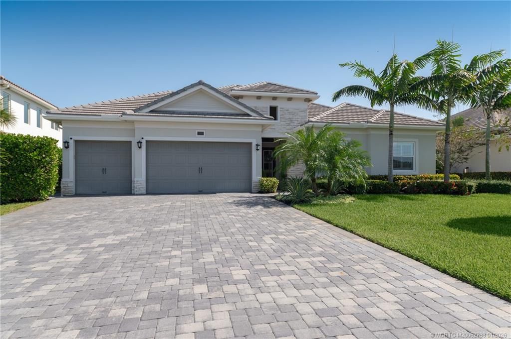 Photo of 2505 NE Evinrude Circle, Jensen Beach, FL 34957 (MLS # M20052788)