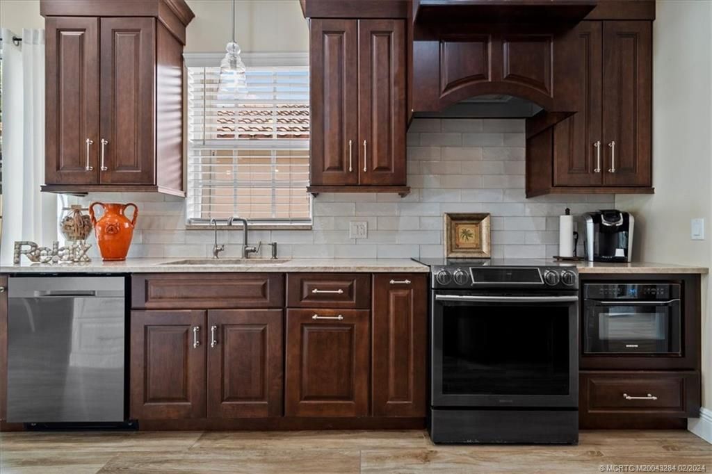 Photo of 8532 SE Palm Hammock Lane, Hobe Sound, FL 33455 (MLS # M20043284)