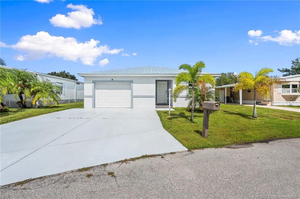 Photo of 4 La Paloma Lane, Port Saint Lucie, FL 34952 (MLS # M20051996)