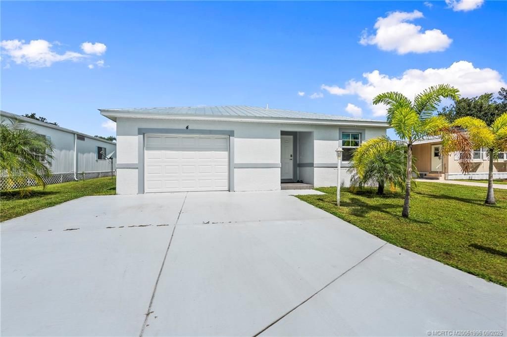 Photo of 4 La Paloma Lane, Port Saint Lucie, FL 34952 (MLS # M20051996)