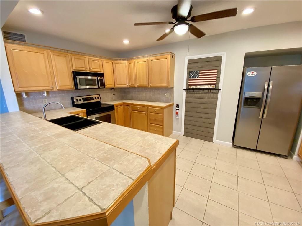 Photo of 1641 NE South Street, Jensen Beach, FL 34957 (MLS # M20045308)