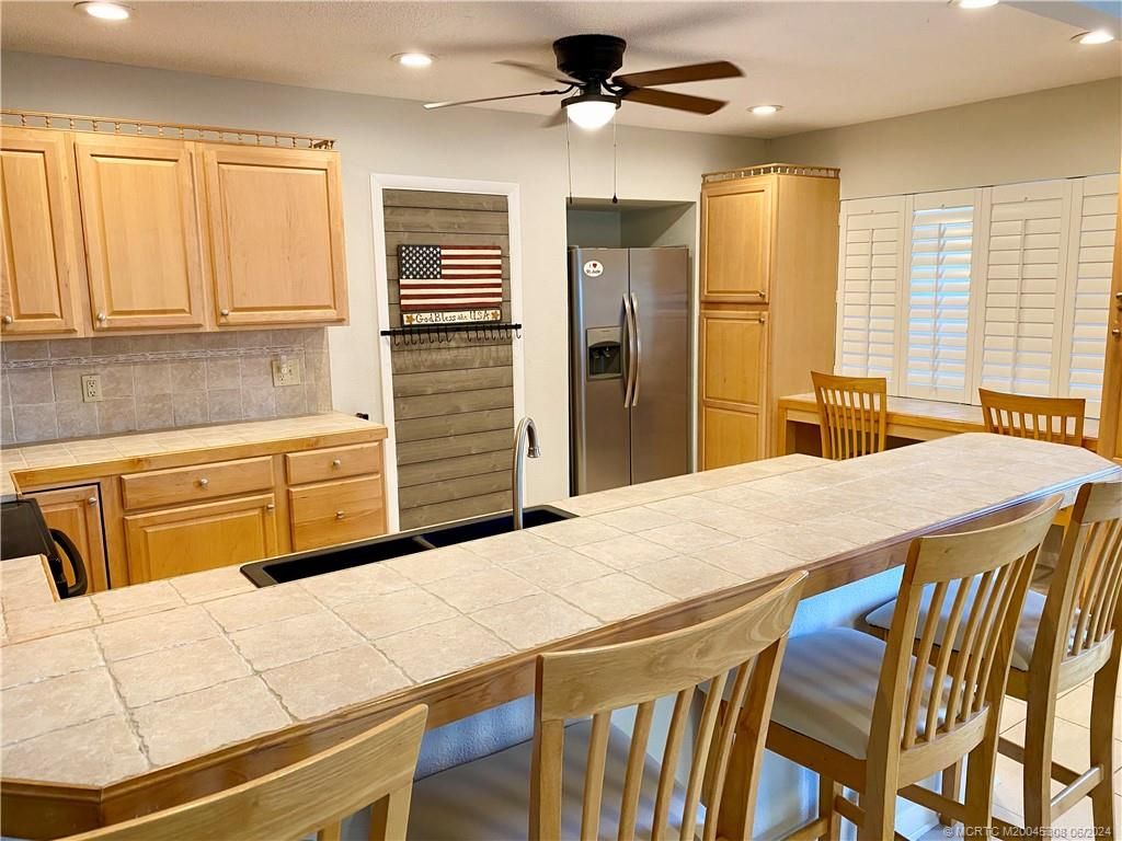 Photo of 1641 NE South Street, Jensen Beach, FL 34957 (MLS # M20045308)