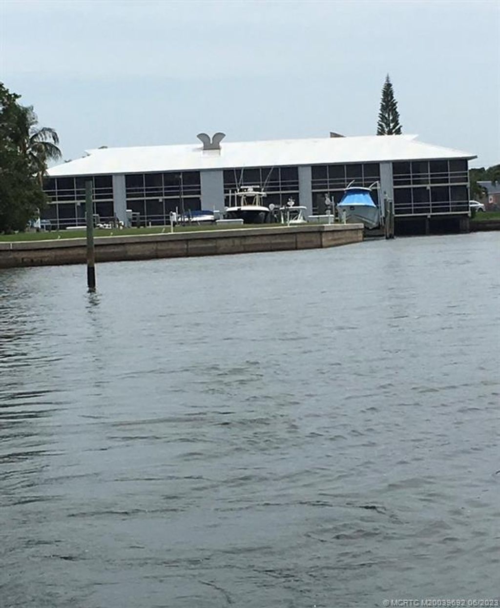 Photo of 200 N El Mar Drive #A-103, Jensen Beach, FL 34957 (MLS # M20039692)