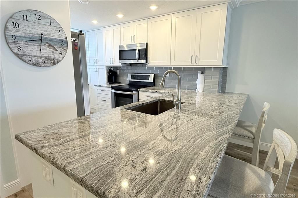 Photo of 10600 S Ocean Drive #1205, Jensen Beach, FL 34957 (MLS # M20055117)