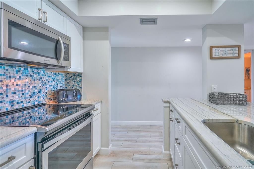 Photo of 5602 NE Gulfstream Way, Stuart, FL 34996 (MLS # M20036477)