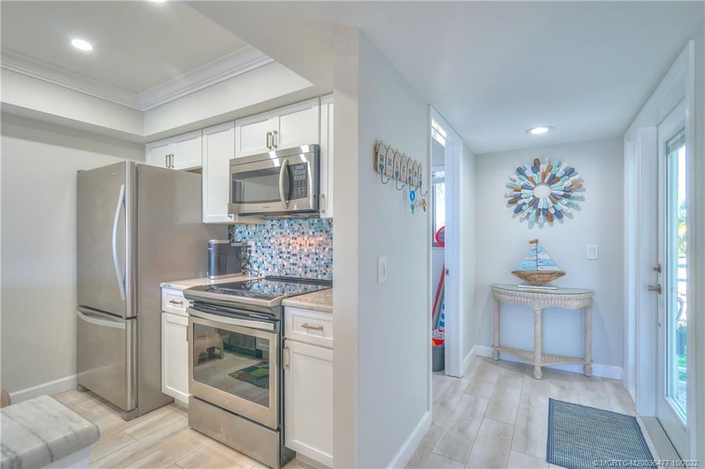 Photo of 5602 NE Gulfstream Way, Stuart, FL 34996 (MLS # M20036477)