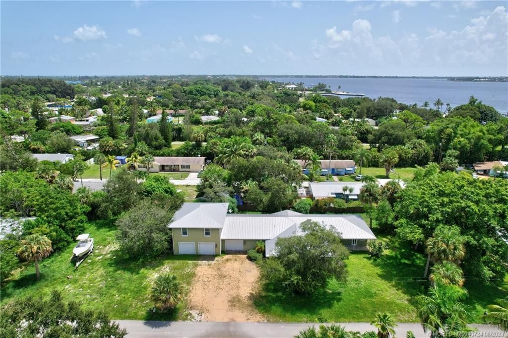 Photo of 1047 NE Kubin Avenue, Jensen Beach, FL 34957 (MLS # M20040724)