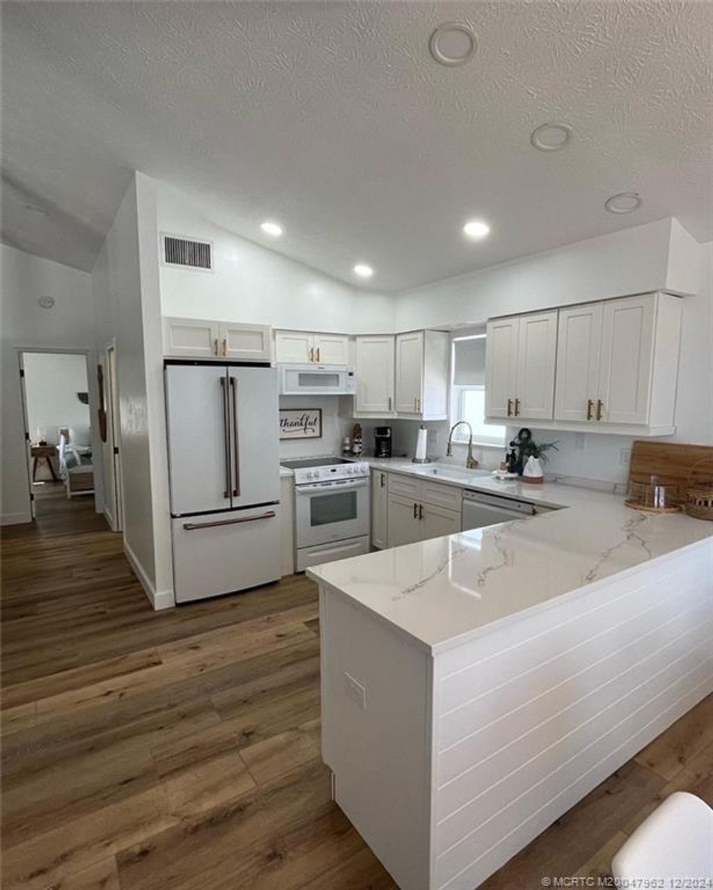 Photo of 68 Nettles Boulevard, Jensen Beach, FL 34957 (MLS # M20047962)