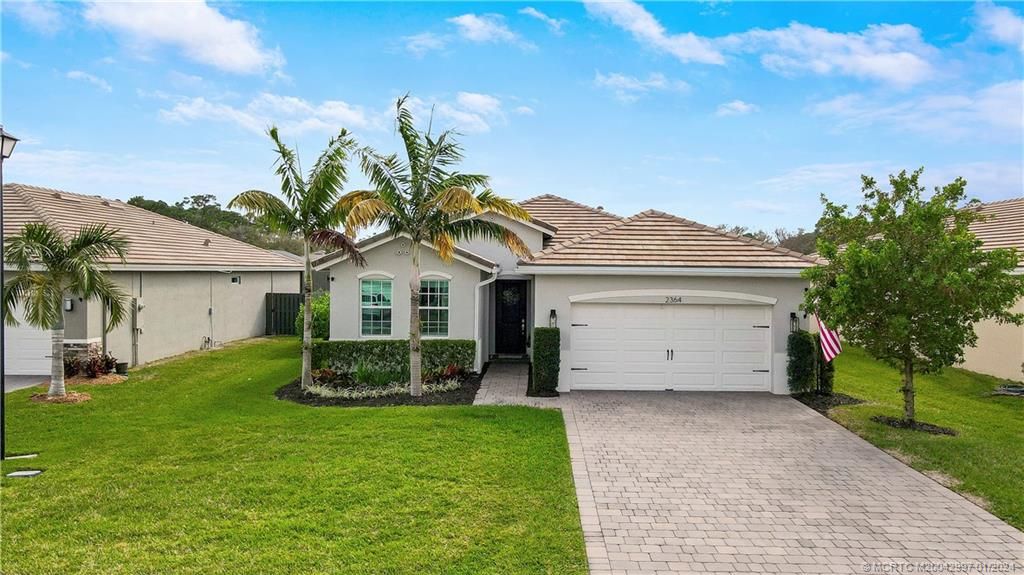 Photo of 2364 SW Strawberry Terrace, Palm City, FL 34990 (MLS # M20042997)