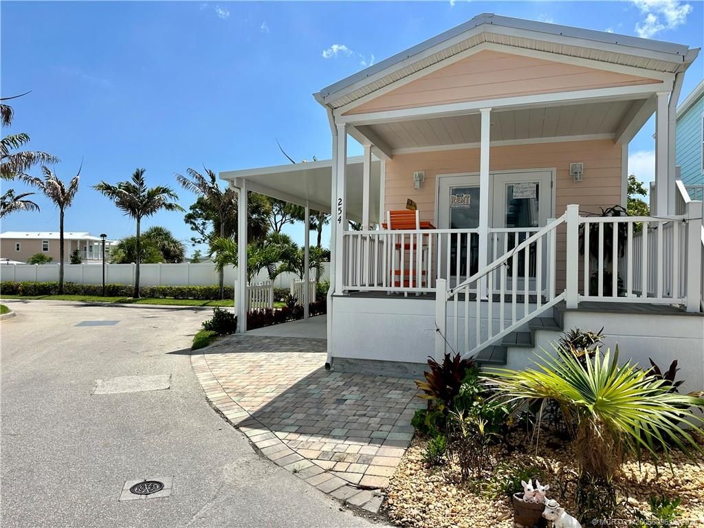 Photo of 254 NE Coastal, Jensen Beach, FL 34957 (MLS # M20056096)