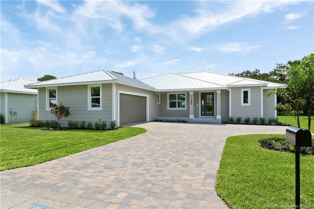 Photo of 1133 NE Orange Avenue, Jensen Beach, FL 34957 (MLS # M20045495)