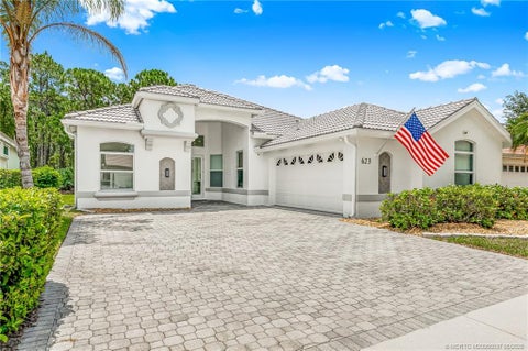 Photo of 623 SW Lake Charles Circle, Port Saint Lucie, FL 34986 (MLS # M20056037)
