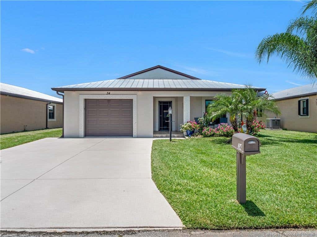 Photo of 34 Monterey Way, Port Saint Lucie, FL 34952 (MLS # M20056310)