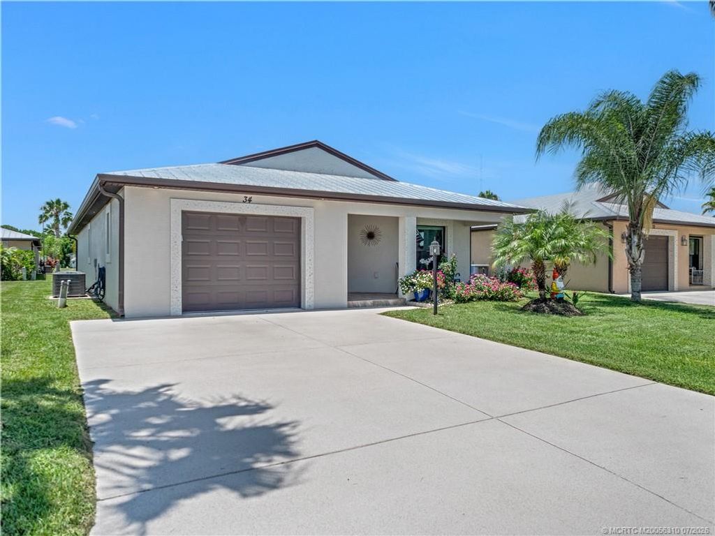 Photo of 34 Monterey Way, Port Saint Lucie, FL 34952 (MLS # M20056310)