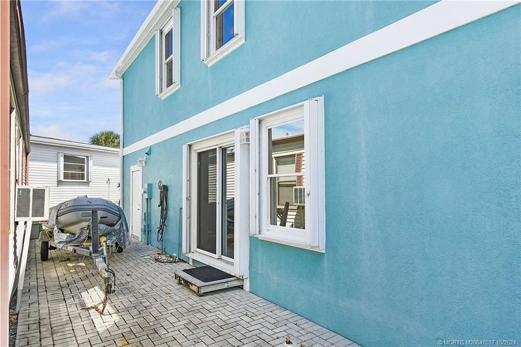 Photo of 935 Nettles Boulevard, Jensen Beach, FL 34957 (MLS # M20047037)