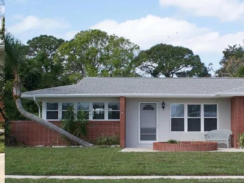 Photo of 874 SW Ivanhoe Drive, Port Saint Lucie, FL 34983 (MLS # M20053396)