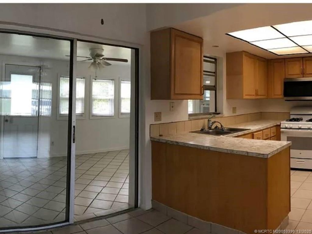 Photo of 874 SW Ivanhoe Drive, Port Saint Lucie, FL 34983 (MLS # M20053396)