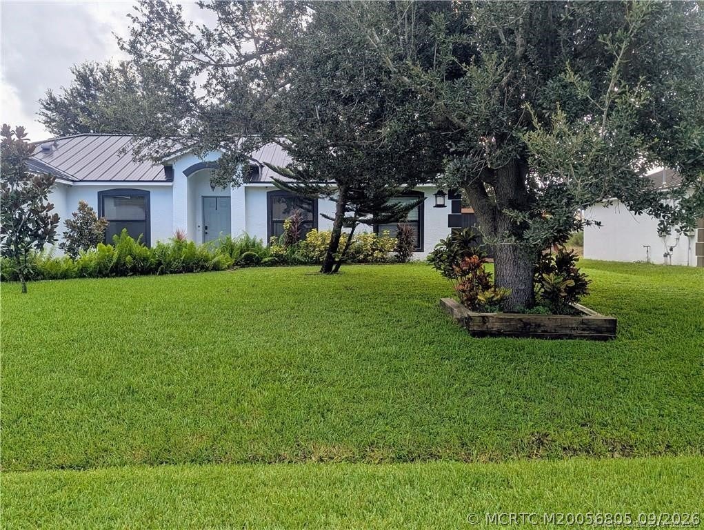 Photo of 2097 SW Savage Boulevard, Port Saint Lucie, FL 34953 (MLS # M20056805)