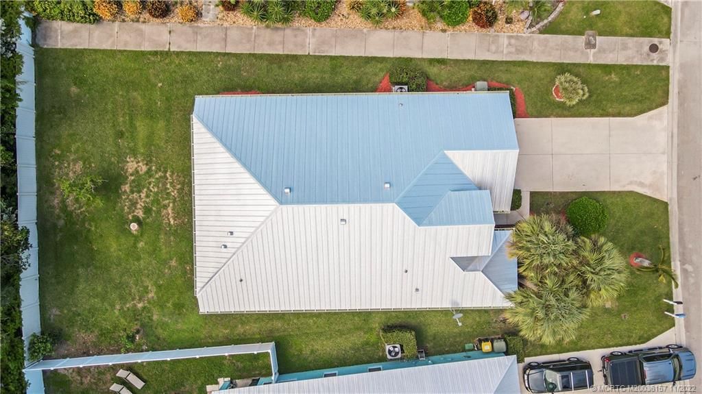 Photo of 856 NW Waterlily Place NW, Jensen Beach, FL 34957 (MLS # M20036157)