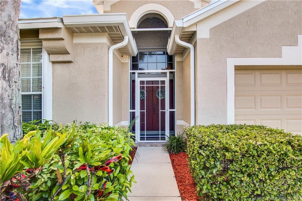Photo of 856 NW Waterlily Place NW, Jensen Beach, FL 34957 (MLS # M20036157)