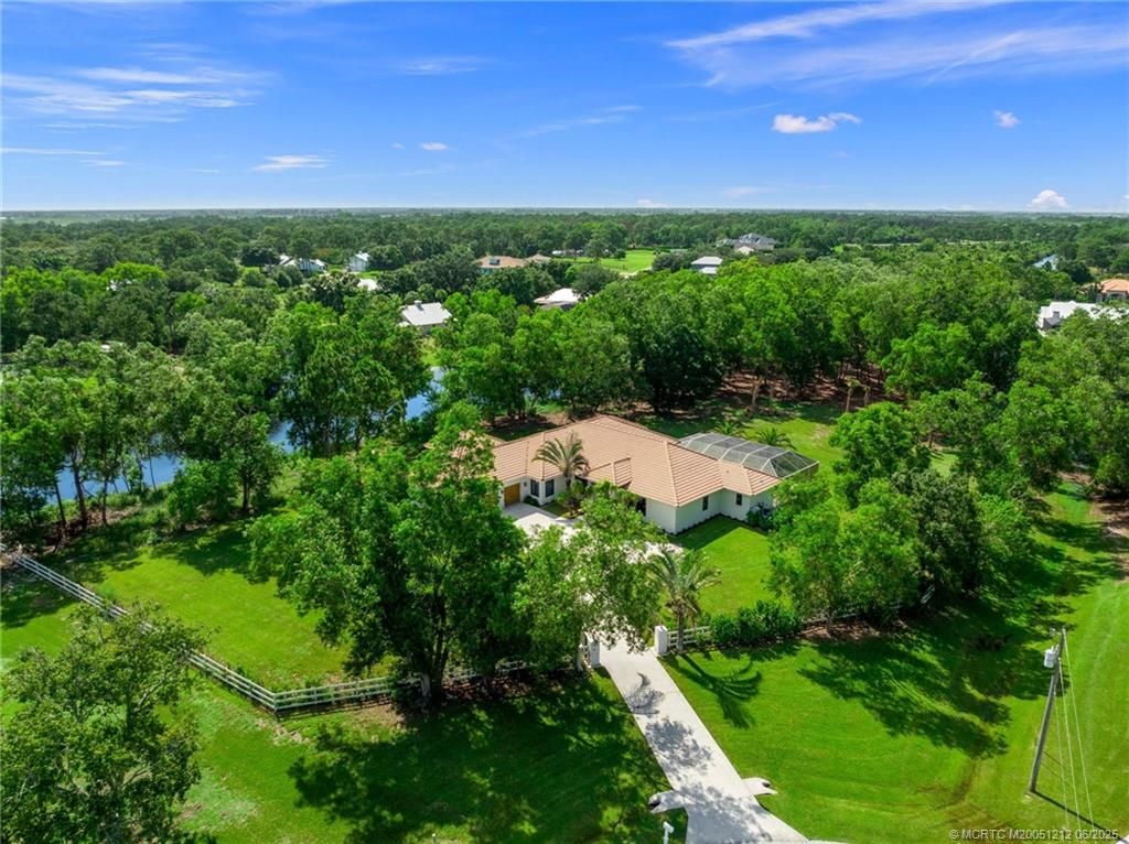 Photo of 9856 SW Pueblo Terrace, Palm City, FL 34990 (MLS # M20051212)